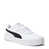 Championes Puma modelo Carina 3.0, de diseño urbano con plataforma texturizada. Presenta una base blanca con la franja lateral característica de la marca en color negro y detalles de logo en dorado.