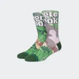 Medias Stance con diseño de El Libro de la Selva, con estampado de hojas verdes y personajes de la película.