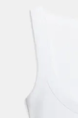 Musculosa de algodón fit entallado con escote redondo y diseño liso.