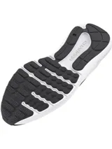 Championes de running Under Armour modelo Charged Surge 4, color negro con entresuela blanca. Presentan parte superior de malla transpirable con superposiciones sintéticas, amortiguación Charged Cushioning en la entresuela y suela de goma resistente.