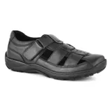 Sandalias de cuero color marrón para hombre, estilo cerrado con aberturas laterales y en la puntera, ajuste mediante tira con velcro en el empeine y suela de goma marrón oscura.