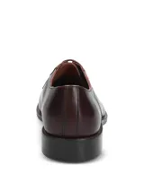 Zapato formal de cuero Hush Puppies modelo Blues, color vino (bordó oscuro), de diseño clásico con cordones y suela de goma.