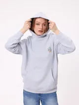 Canguro color crema con capucha y estampado grande en la espalda de un sol con un ojo, montañas, mariposas y texto.