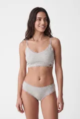 Culotte de tejido melange gris con detalles de encaje festoneado en la cintura y las piernas.
