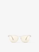 Lentes de sol Izipizi modelo #Sun E, con montura de acetato transparente y cristales amarillos.