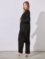 Conjunto de cardigan largo y pantalón palazzo plisado color celeste.