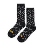 Medias de caña media color negro con estampado de herramientas en gris y logo de la marca en amarillo en la puntera.