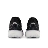 Championes New Balance 1080 para dama, color negro con detalles en blanco, ideales para running.