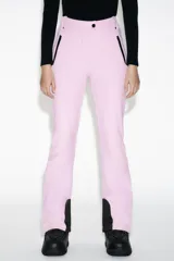 Pantalón de esquí rosa con corte flare, tiro alto, bolsillos frontales con cremallera y bajos con cremallera y aplicación de parche técnico.