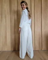 Pantalón de jean azul de corte palazzo.