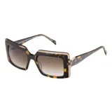 Lentes de sol Teresa Calandra modelo Cheryl, con armazón rectangular de carey con detalles degradé y patillas anchas con aplique metálico y logo. Lentes degradados.