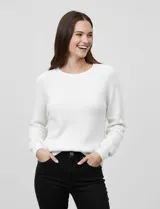 Buzo de tejido combinado marca Zac & Rachel en color blanco, con cuello redondo y mangas largas con diseño calado. Presenta un cuerpo con textura de punto acanalado.