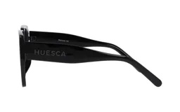 Lentes de sol cuadrados con montura gruesa de acetato color negro y lentes grises.