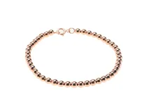 Pulsera de plata 925 con baño de oro rosa, compuesta por esferas pequeñas.