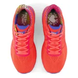 Championes de running New Balance 880 para hombre, color naranja con detalles en azul y violeta.