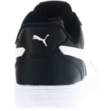 Championes urbanos Puma modelo Caven, color negro con detalles en blanco. Presentan diseño de corte bajo, cierre con cordones y suela de goma blanca.
