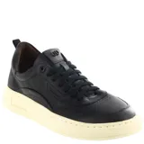 Championes urbanos Democrata modelo Muli, color negro con suela de goma en tono crema. Presentan un diseño acordonado con detalles perforados en la puntera y logo de la marca grabado en el lateral y en la suela.