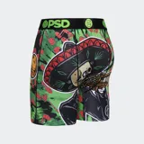Calzoncillos bóxer de hombre PSD con estampado de esqueleto mariachi sobre fondo verde con notas musicales. Cuenta con pretina elástica negra con logo de la marca en verde, entrepierna de 7 pulgadas y bolsa MicroMesh transpirable.