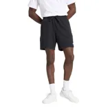 Short deportivo negro de algodón y poliéster reciclado, con cintura ajustable con cordón, bolsillos laterales y bolsillo trasero. Logo de New Balance estampado en blanco en la pierna izquierda.