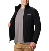 Campera softshell Columbia modelo Ascender, color negro, con cierre frontal, bolsillos laterales y en el pecho con cierre, cuello alto y logo bordado en el pecho.