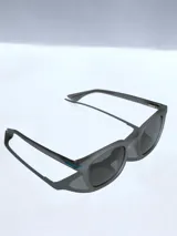 Lentes de sol con armazón de color gris mate y detalles en azul en las patillas. Cuentan con cristales oscuros polarizados y protección UV 400.