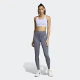 Calza de entrenamiento Adidas de tiro alto, confeccionada en tejido elástico con tecnología AEROREADY. Presenta un diseño ceñido con costuras selladas, cintura elástica de ajuste seguro y un bolsillo oculto en el muslo.