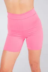 Calza biker rosa de tiro alto.