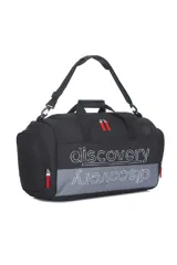 Bolso deportivo tipo duffel bag, color negro y gris, con correas de mano y correa ajustable para hombro. Presenta el texto "discovery" estampado en blanco en la parte superior y en espejo en la parte inferior sobre un panel gris.