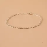 Pulsera de plata 925 con eslabones dobles tipo rolo, de acabado plateado brillante.