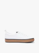 Zapatillas Tommy Hilfiger modelo Harlem Core Cleat de color blanco, con suela de goma marrón y detalles distintivos de la marca.