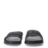 Chanclas tipo slide marca Umbro, color negro, con banda ancha superior que presenta el logo de la marca en relieve. Poseen plantilla anatómica y suela de EVA.
