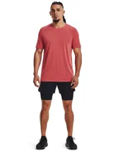Short deportivo Under Armour Vanish Elite 2in1 de color negro, con diseño de doble capa que incluye shorts de compresión integrados. Cuenta con cintura elástica con cordón y perforaciones láser para mayor ventilación.