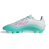 Championes de fútbol Adidas F50 Messi Club, diseñados para terreno firme y césped artificial. Presentan un diseño aerodinámico en color blanco con degradado en turquesa y detalles en fucsia y amarillo neón.