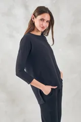 Sweater blanco de algodón y poliéster, de corte holgado y manga 3/4.