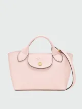 Cartera tote XS Longchamp modelo Epure, de diseño estructurado en color rosado claro con doble asa superior y correa de hombro ajustable y extraíble.