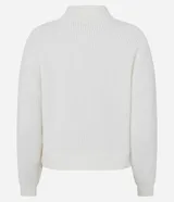 Suéter de punto texturizado con cuello alto, diseño oversized y mangas largas. Presenta una caída amplia y una superficie encorpada, ideal para un estilo moderno y acogedor.