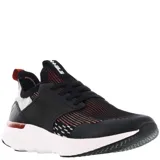 Championes urbanos negros con detalles en rojo y blanco, capellada de tejido de punto y suela blanca con tecnología de amortiguación.