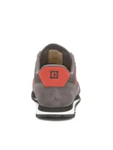 Championes Caterpillar modelo Ventura, color gris con detalles en naranja. Confeccionados en gamuza y material sintético, con suela de EVA ligera y cierre mediante cordones.