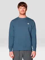 Buzo azul Mountain Hardwear de cuello redondo, confeccionado en mezcla de algodón, con mangas largas, puños y bajo acanalados, y pequeño logo bordado multicolor en el pecho.
