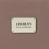 Billetera larga con cierre perimetral, confeccionada en material sintético texturizado color mostaza. Cuenta con correa de mano extraíble y placa metálica con logo de la marca en el frente.