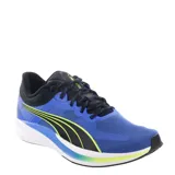 Championes deportivos Puma modelo Redeem Profoam, con parte superior de malla transpirable en color azul, detalles en negro y acentos en amarillo neón. Incorporan tecnología Profoam para una amortiguación superior y suela de goma para mayor tracción.