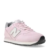 Championes urbanos New Balance modelo 574, color rosado, confeccionados en gamuza y malla. Presentan el logo 'N' característico en los laterales, entresuela ENCAP para mayor amortiguación y suela de goma negra.