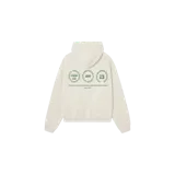 Hoodie oversize color arena con capucha, bolsillos tipo canguro y estampado gráfico en la espalda en tonos verdes.