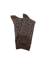 Medias de largo medio color marrón con estampado de pequeñas flores en tonos rosados y celestes. Cuentan con puño suave para mayor comodidad.