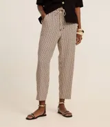 Pantalón fluido de crepé con estampado geométrico, cintura alta con elástico y lazo.