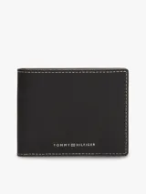 Billetera plegable Tommy Hilfiger de piel Saffiano color negro, con acabado texturizado, costuras blancas a contraste y logo metálico en la parte delantera.