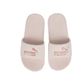 Ojotas Puma modelo Cool Cat 2.0 BX, color rosado con logo de la marca en tono oro rosa en la banda superior. Presentan una plantilla texturizada con diseño de ondas y logo grabado.