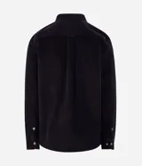 Camisa de terciopelo cotelé color negro, de corte clásico con cuello solapa, manga larga, cierre frontal de botones y un bolsillo aplicado en el pecho.