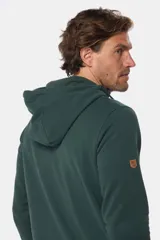 Canguro de felpa color azul marino, con medio cierre frontal y capucha. Presenta un bolsillo canguro frontal y detalles en cuero ecológico en el tirador del cierre.