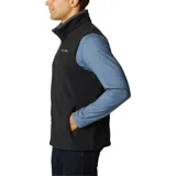 Chaleco de forro polar negro de la marca Columbia, con cierre frontal, cuello alto y bolsillos laterales y en el pecho con cierre.